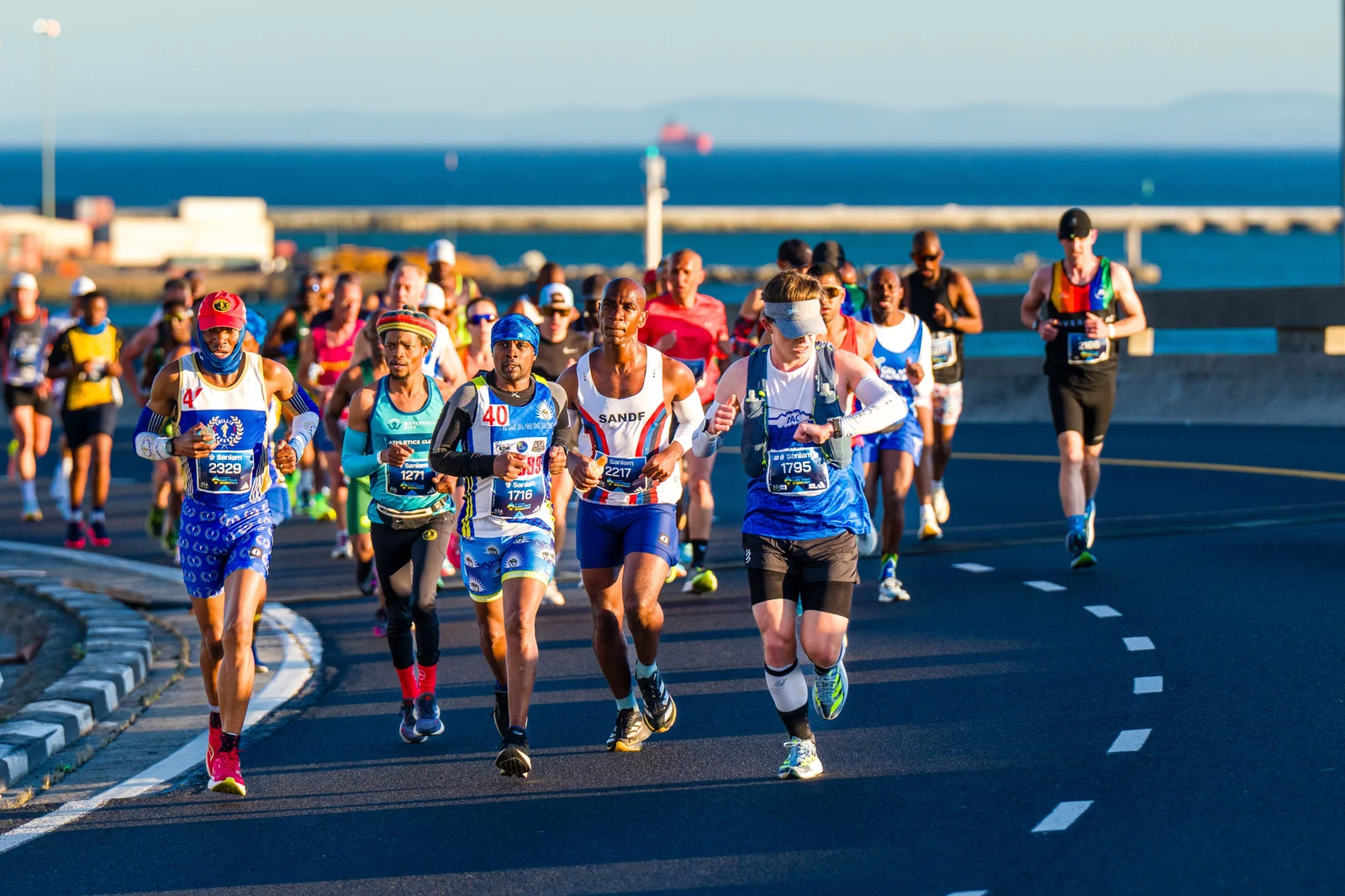 Cape Town Marathon runners alongside the ocean